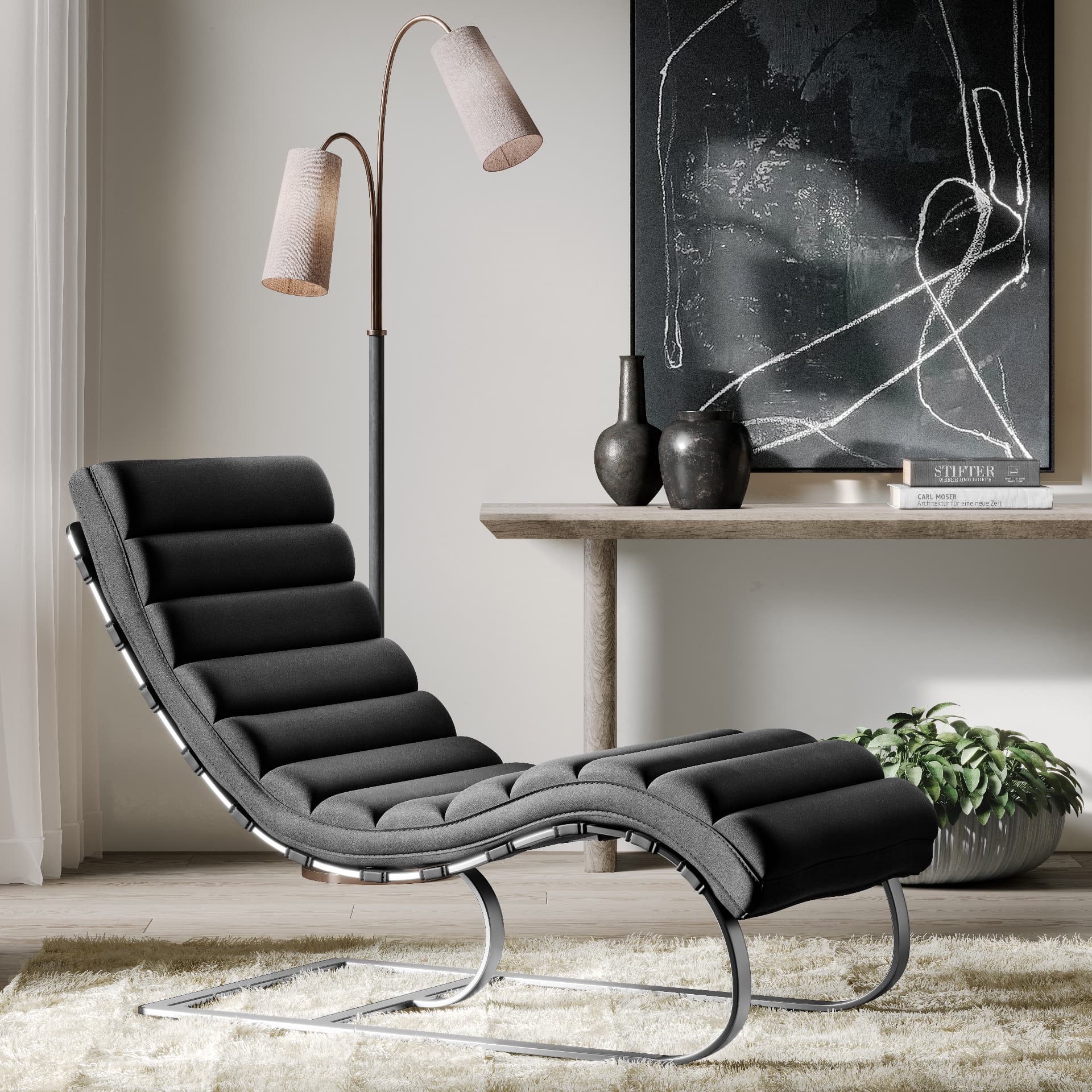 A dark grey leather chaise longue in a contemporary interior