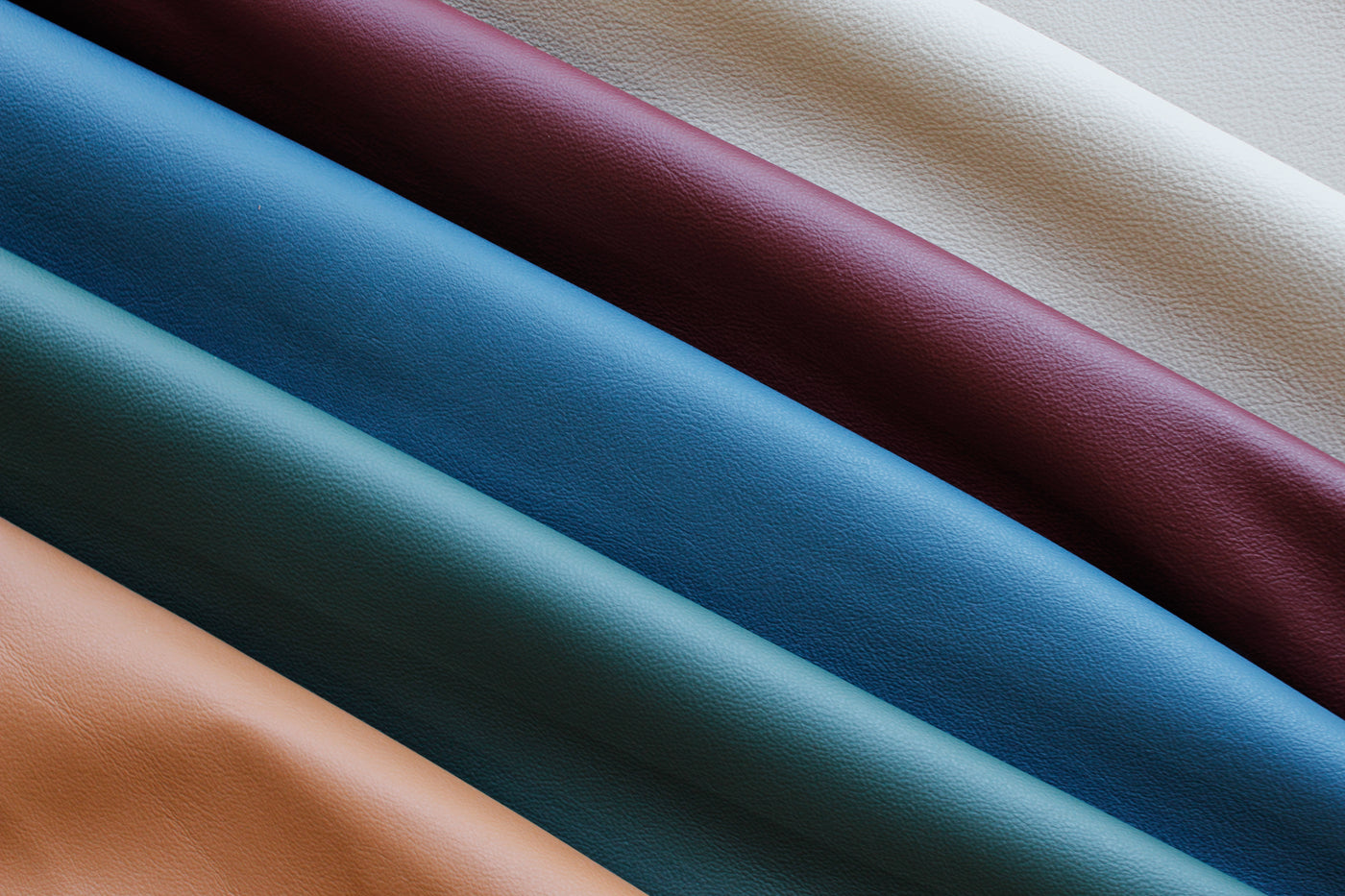 Folded Jerry Pair Leather hides in teal, blue, burgundy, blush and ivory