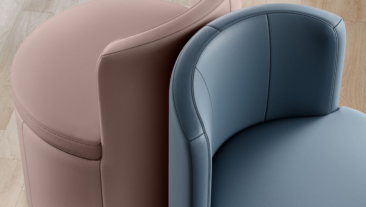 Leather-upholstered tub chair and ottoman in blush and slate blue