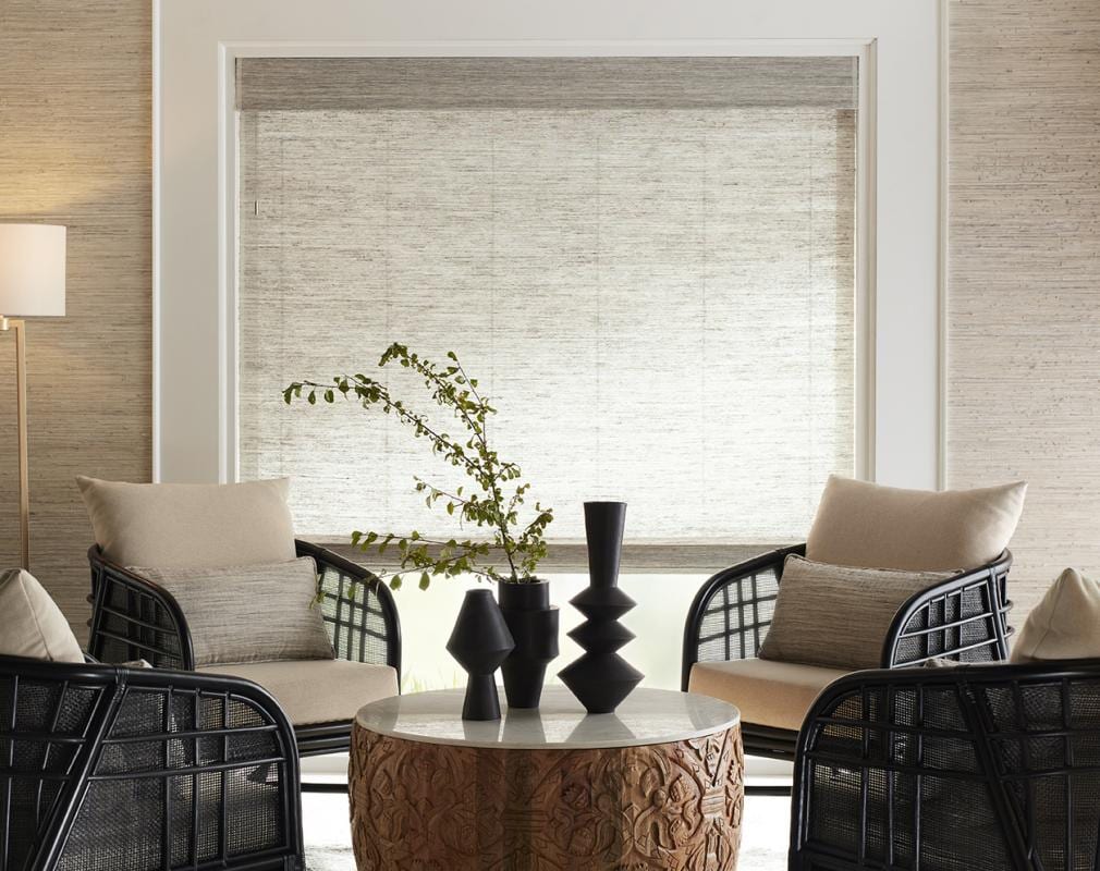 Hartmann & Forbes — hand-loomed grasscloth catching low, filtered light