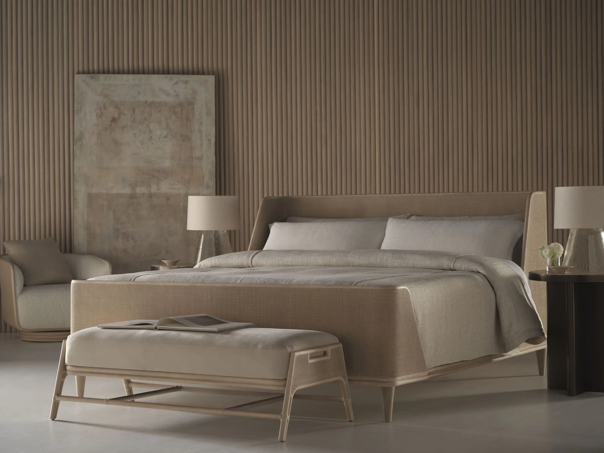 Bedroom in pale neutrals — bench-made hardwood frame, upholstered bench, single sculpted bedside table